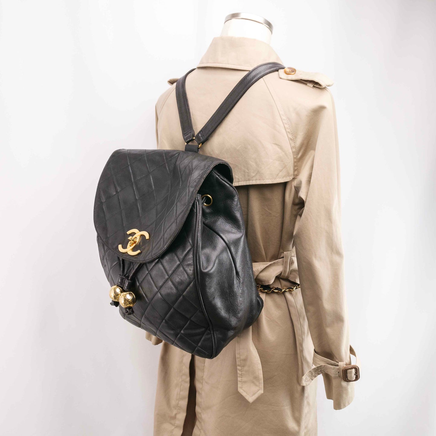 Authentic CHANEL  Lambskin Quilted Tassel Drawstring Backpack Black