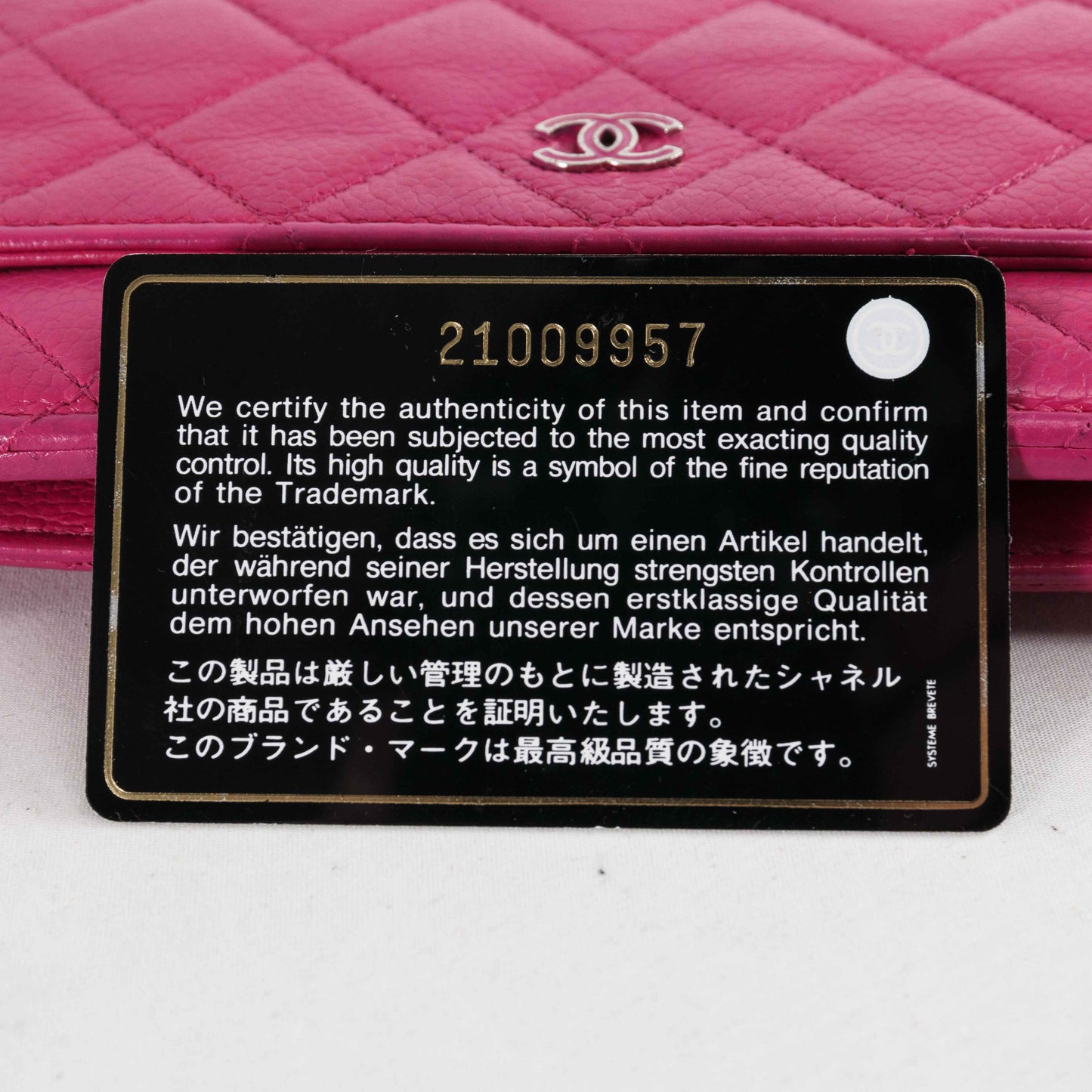 Chanel Classic Quilted Chain Wallet in Pink Caviar Leather