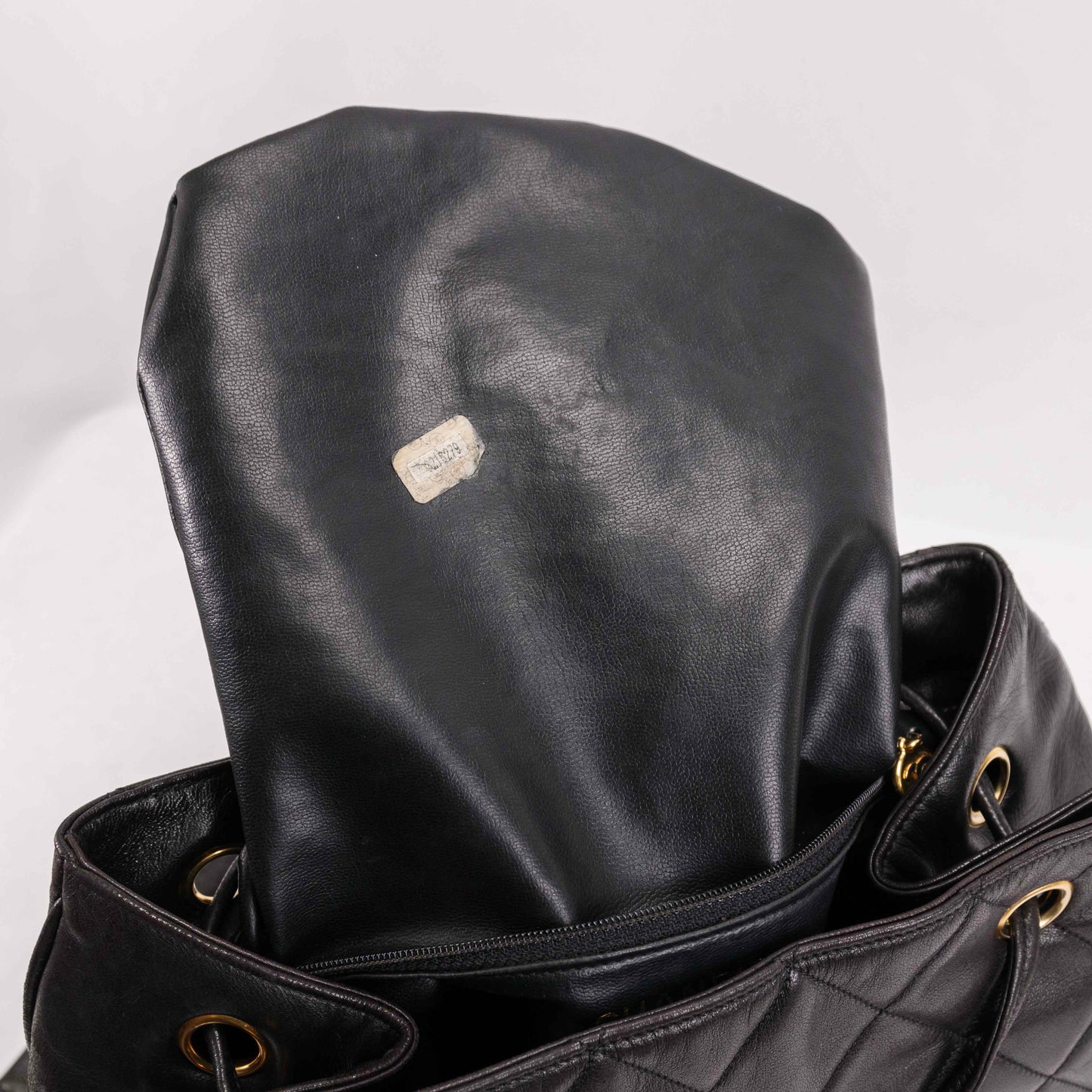 Authentic CHANEL  Lambskin Quilted Tassel Drawstring Backpack Black