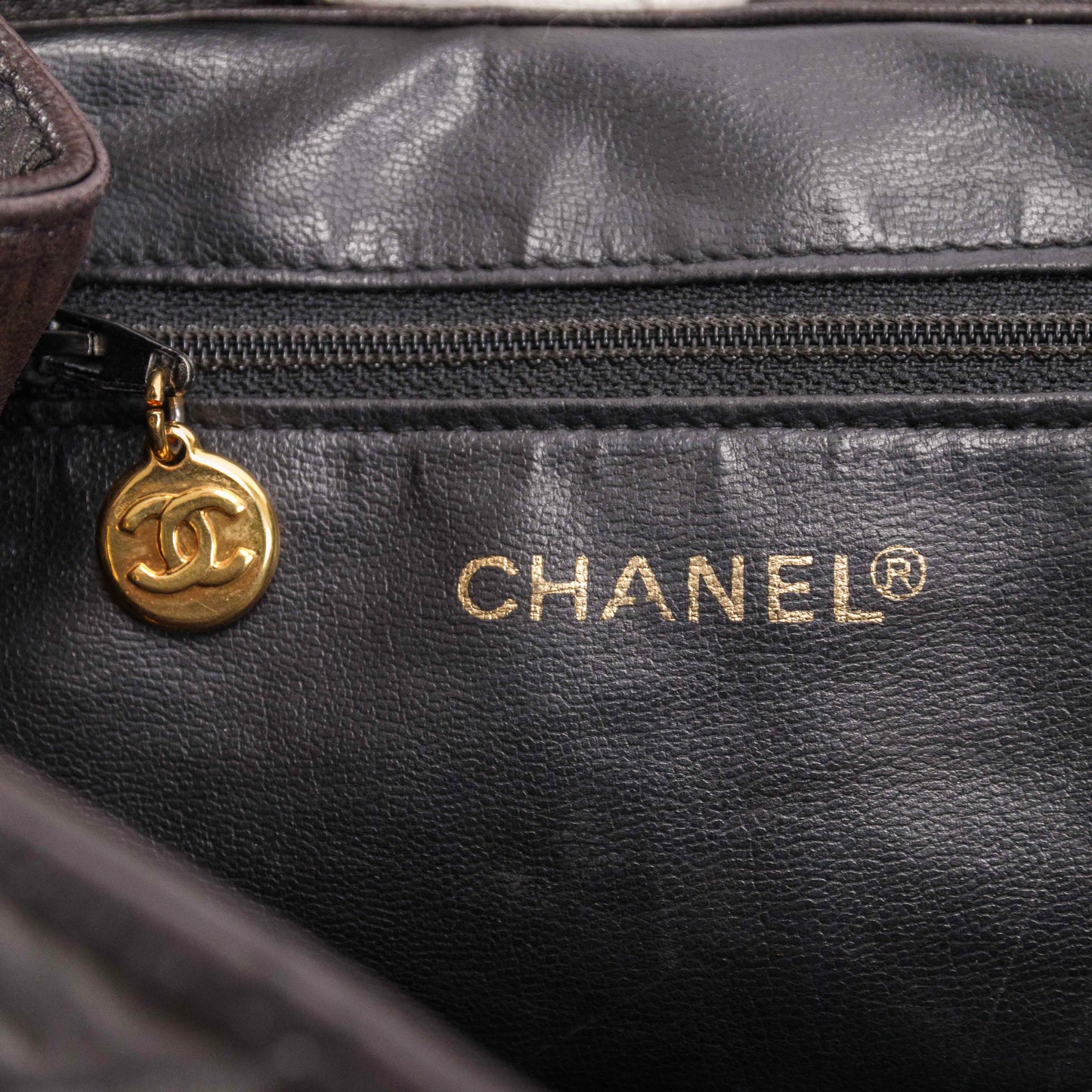 Authentic CHANEL  Lambskin Quilted Tassel Drawstring Backpack Black