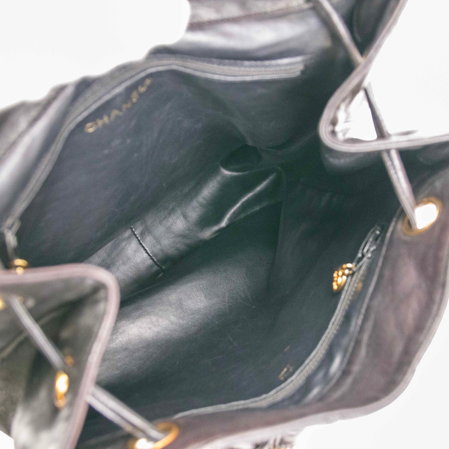 Authentic CHANEL  Lambskin Quilted Tassel Drawstring Backpack Black