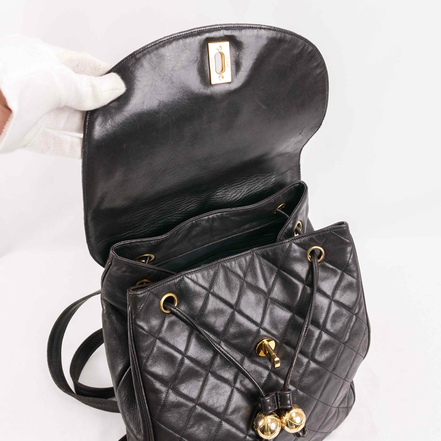 Authentic CHANEL  Lambskin Quilted Tassel Drawstring Backpack Black