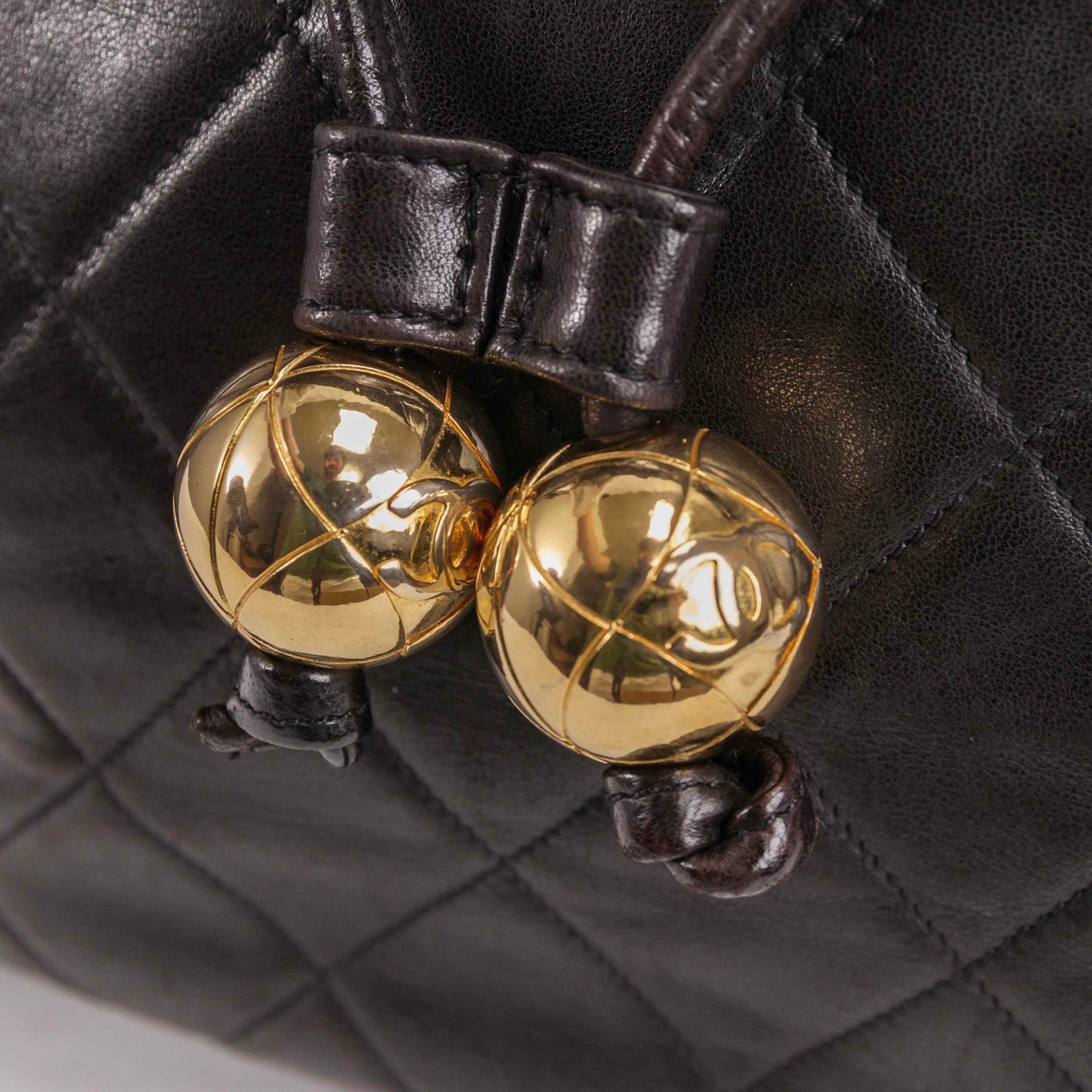 Authentic CHANEL  Lambskin Quilted Tassel Drawstring Backpack Black