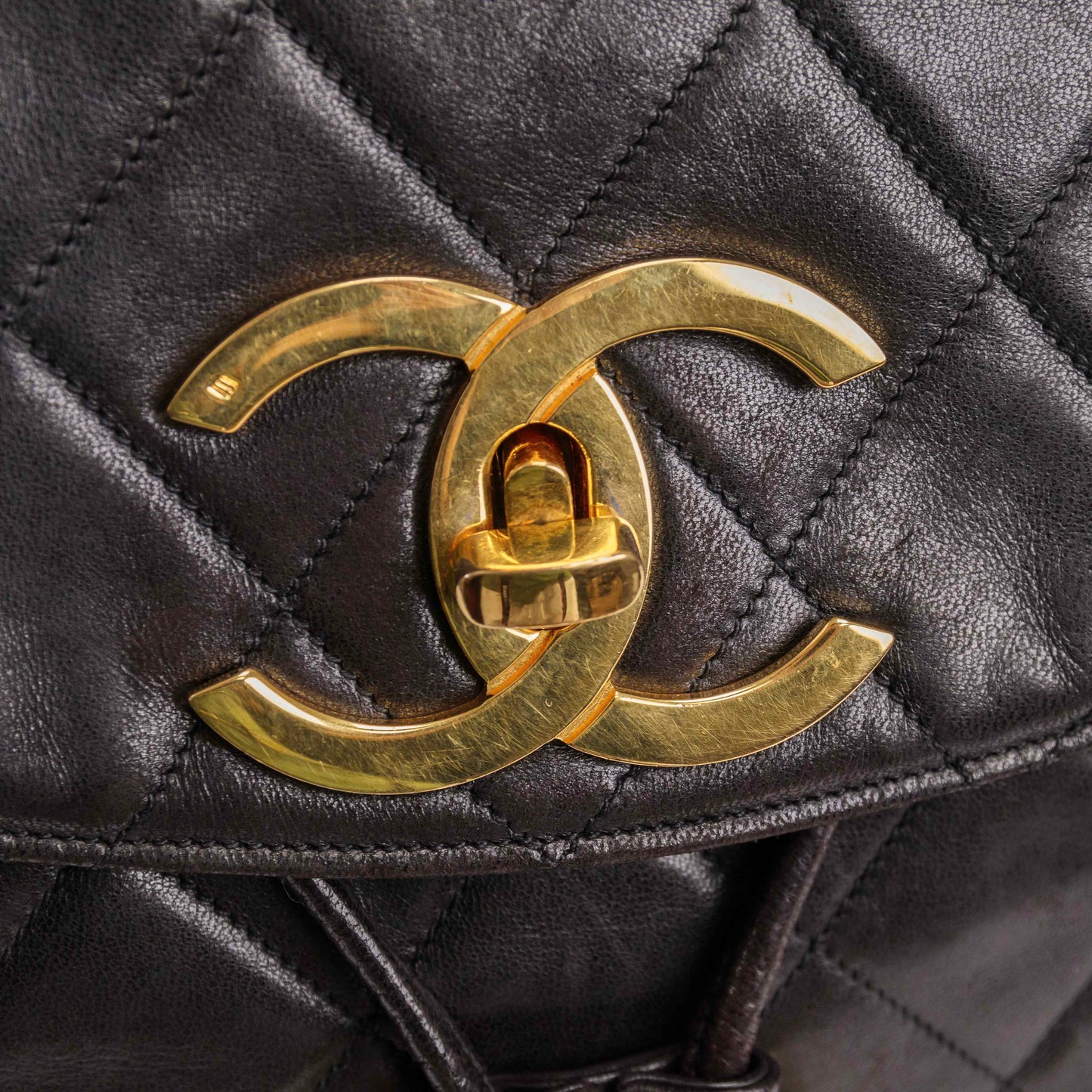 Authentic CHANEL  Lambskin Quilted Tassel Drawstring Backpack Black