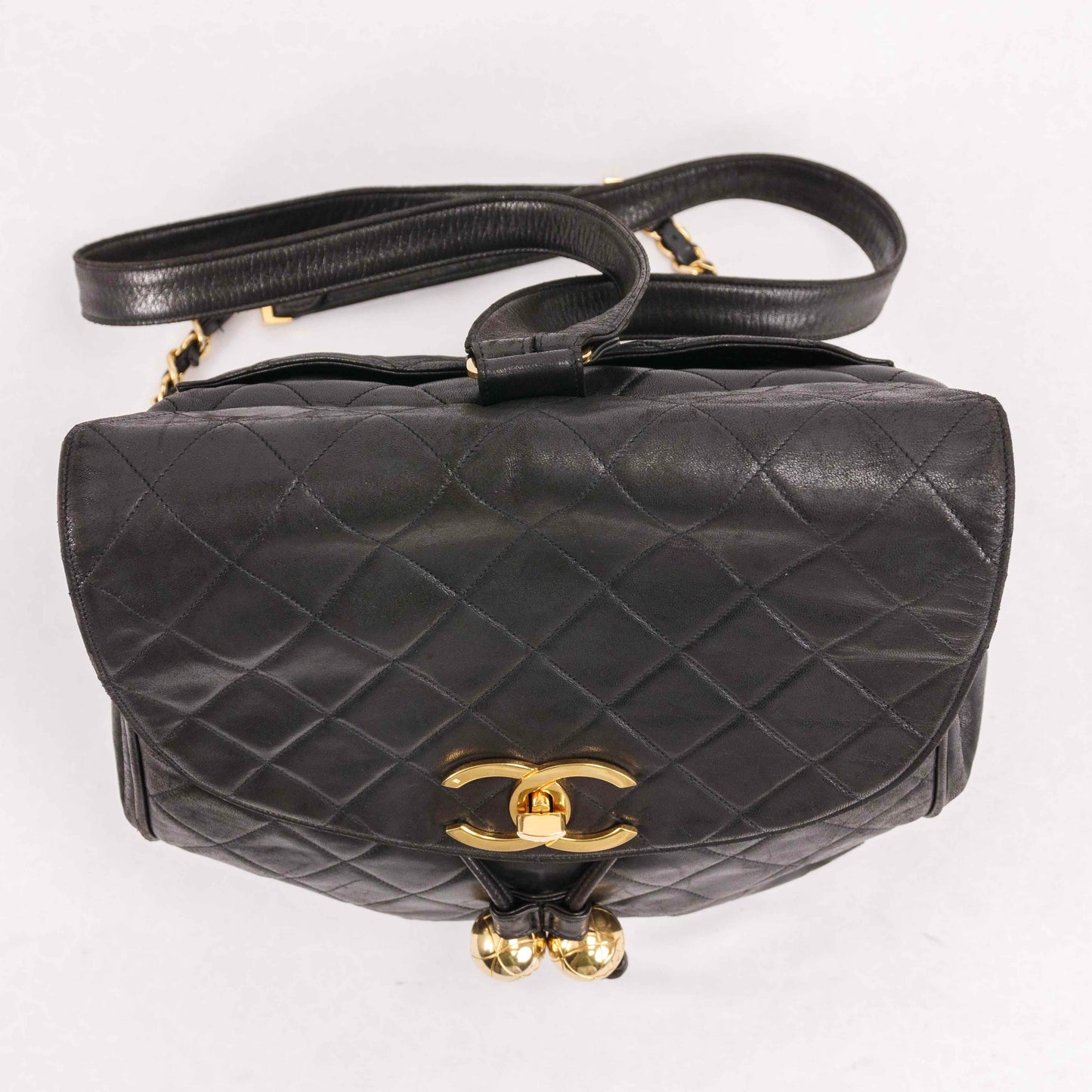 Authentic CHANEL  Lambskin Quilted Tassel Drawstring Backpack Black