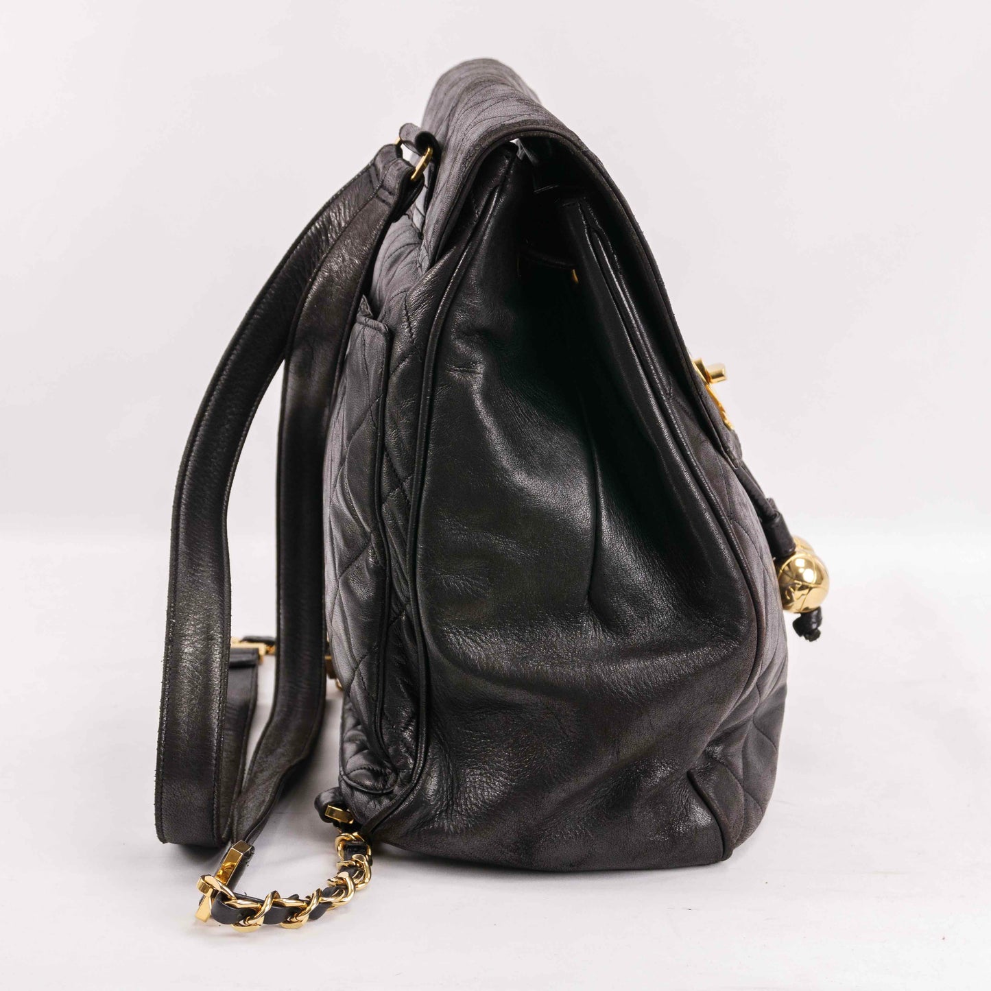 Authentic CHANEL  Lambskin Quilted Tassel Drawstring Backpack Black