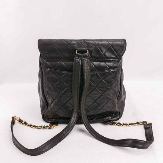 Authentic CHANEL Lambskin Quilted Tassel Drawstring Backpack Black