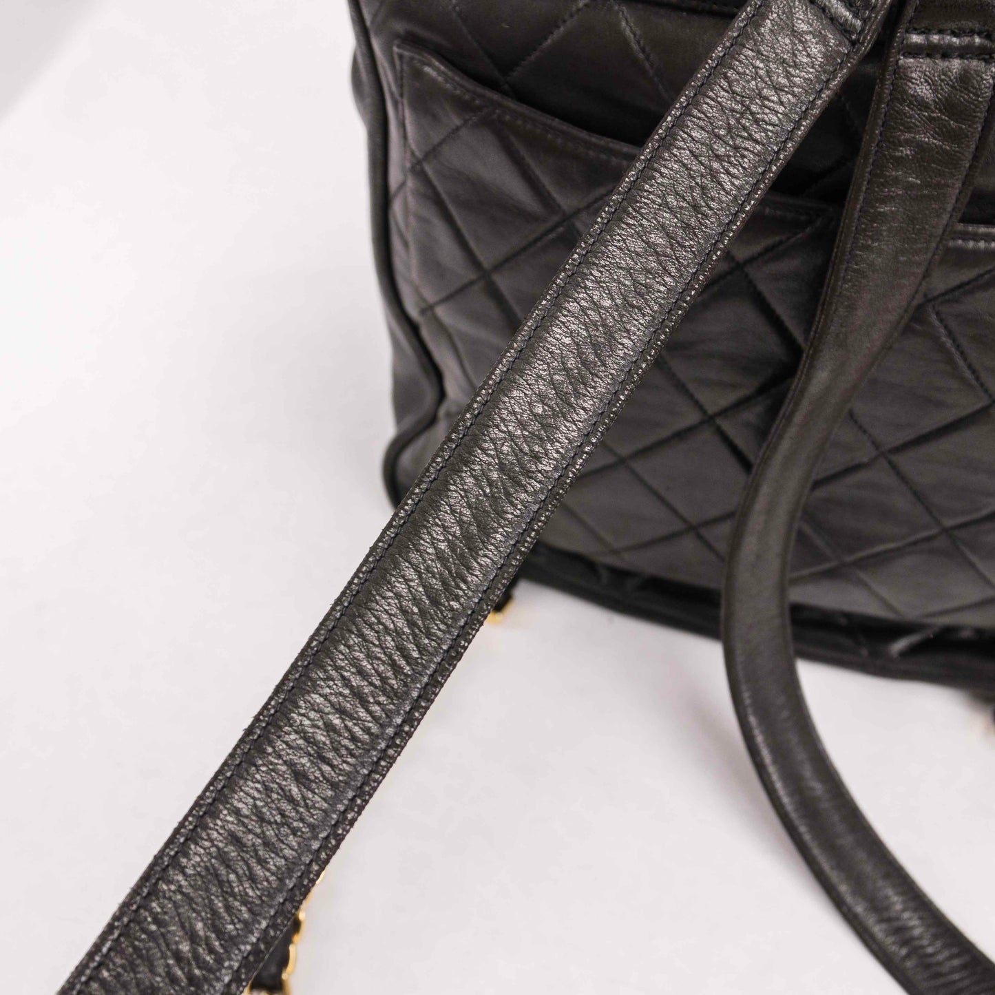 Authentic CHANEL  Lambskin Quilted Tassel Drawstring Backpack Black