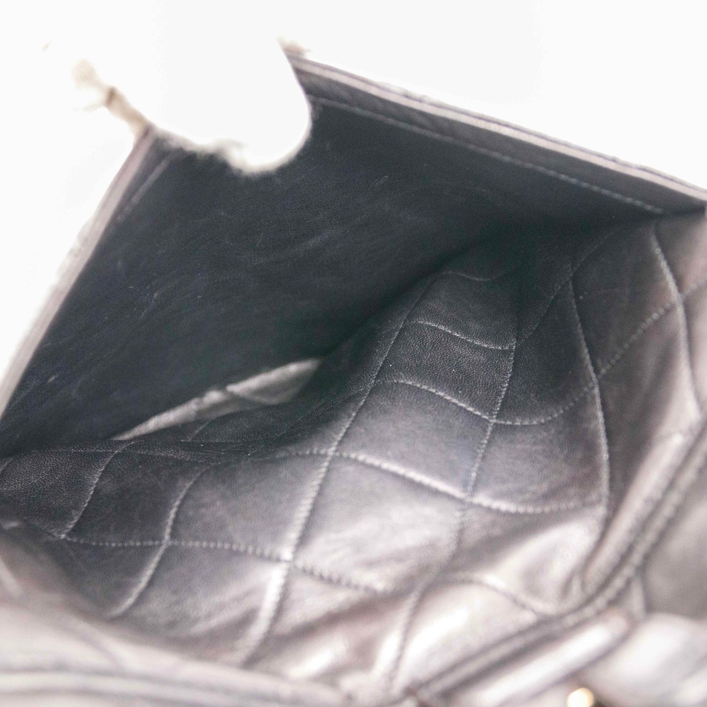 Authentic CHANEL  Lambskin Quilted Tassel Drawstring Backpack Black