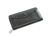Authentic Must De Cartier black zippy wallet