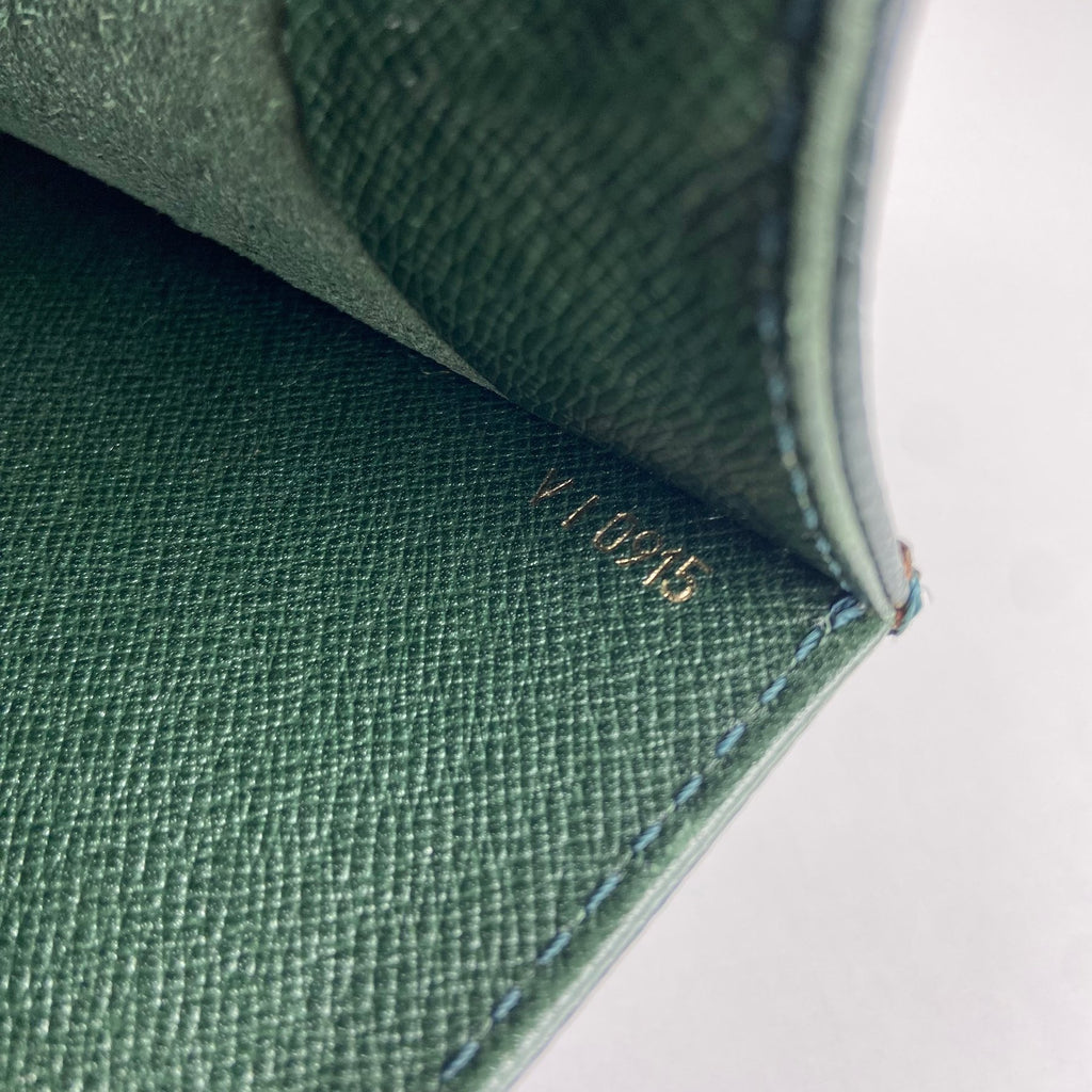 Authentic Louis Vuitton Taiga Serviette Kourad soft business bag green