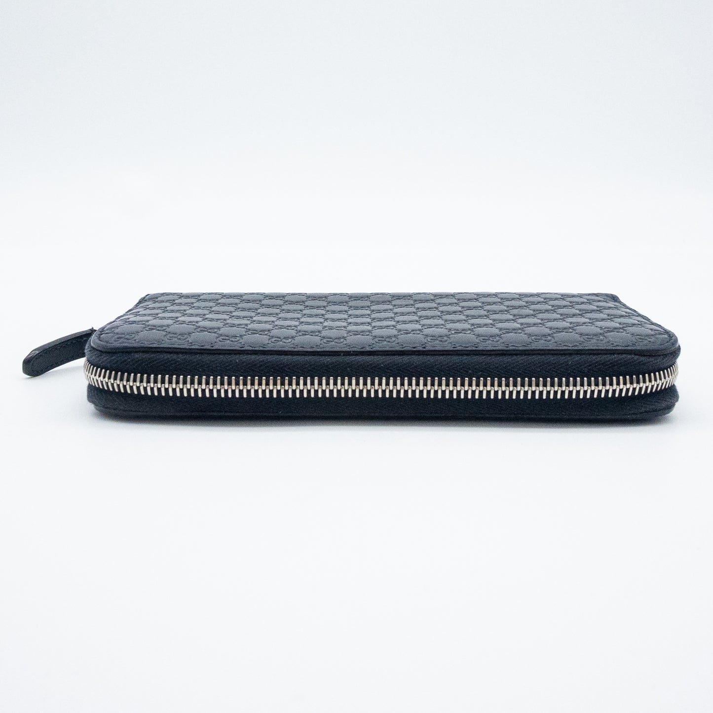 Gucci GG Embossed Navy Blue Zip-Around Wallet