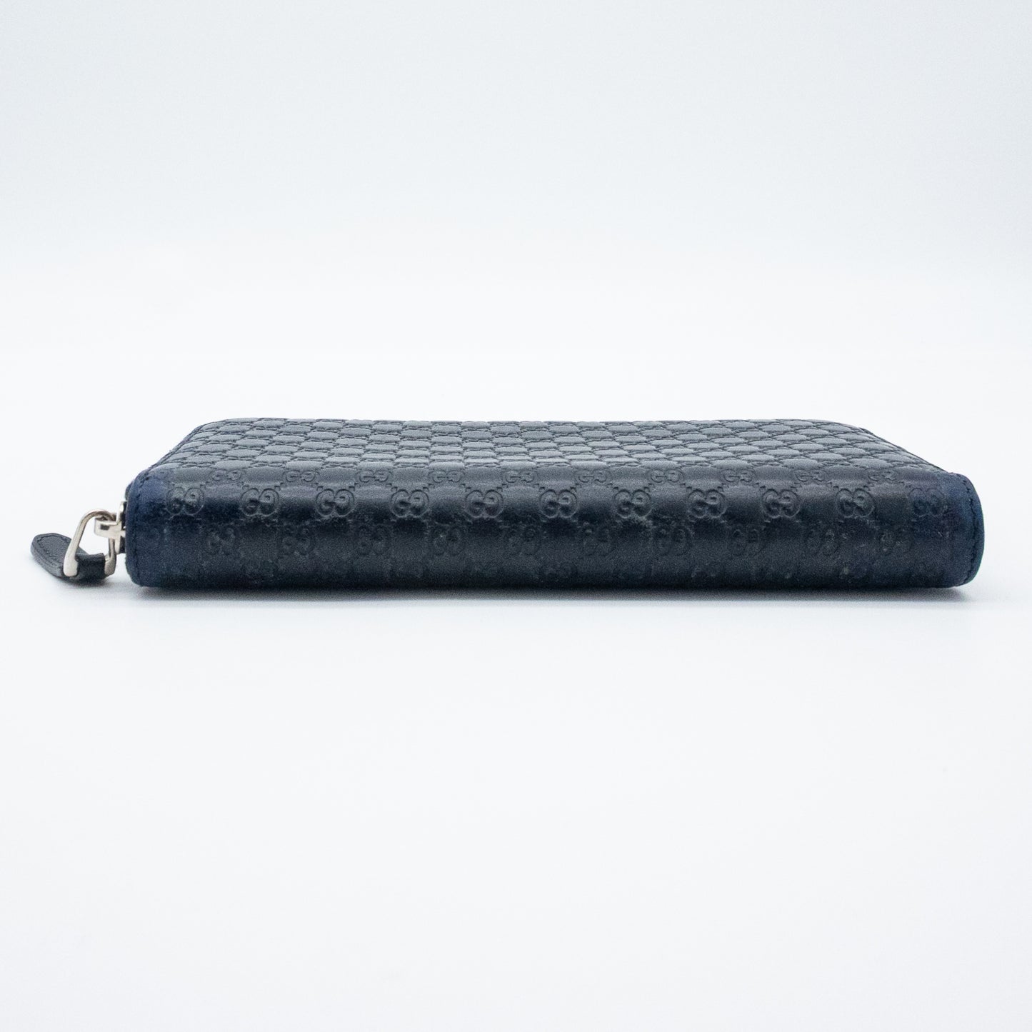Gucci GG Embossed Navy Blue Zip-Around Wallet