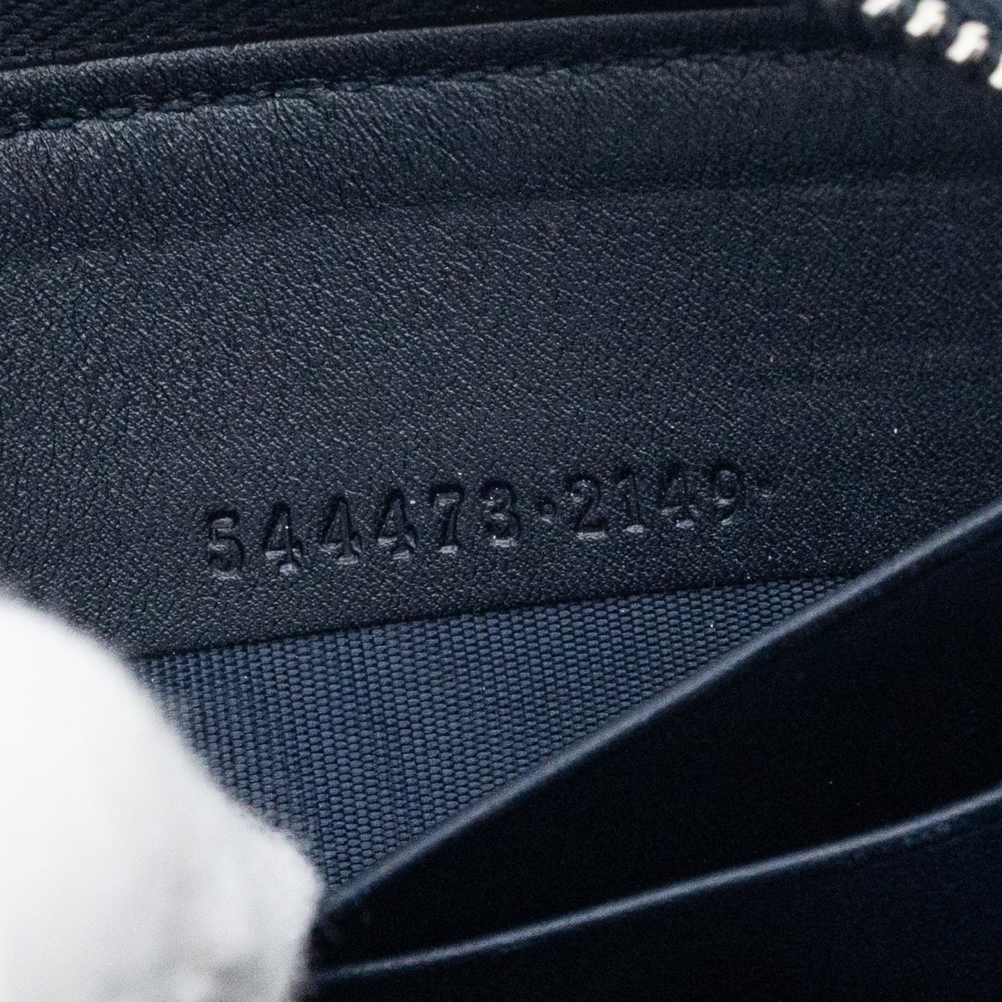 Gucci GG Embossed Navy Blue Zip-Around Wallet