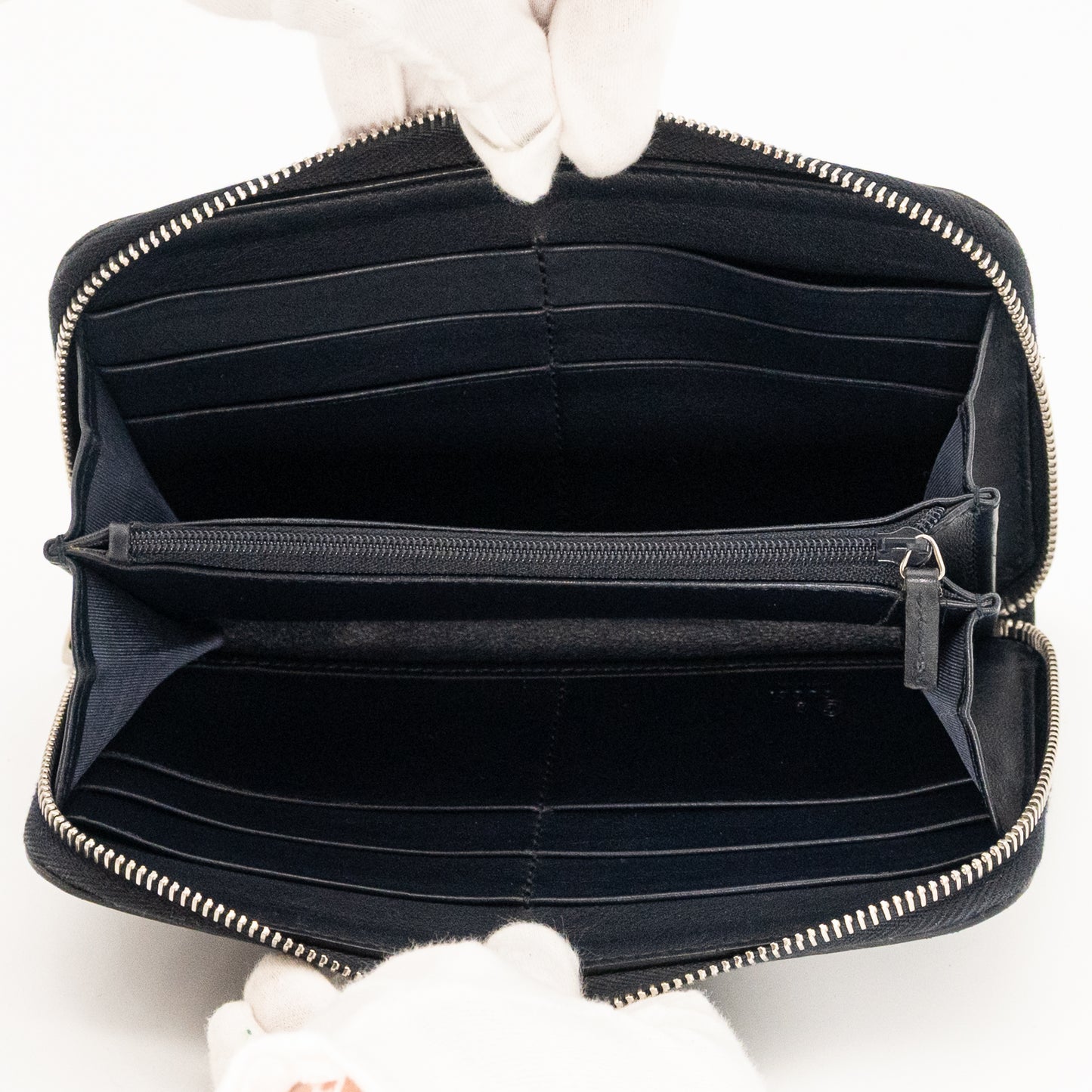 Gucci GG Embossed Navy Blue Zip-Around Wallet