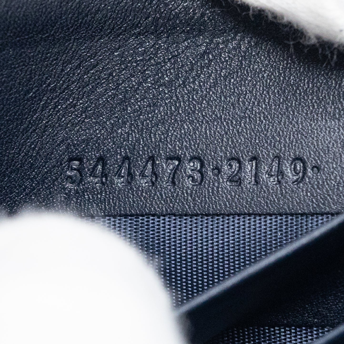 Gucci GG Embossed Navy Blue Zip-Around Wallet