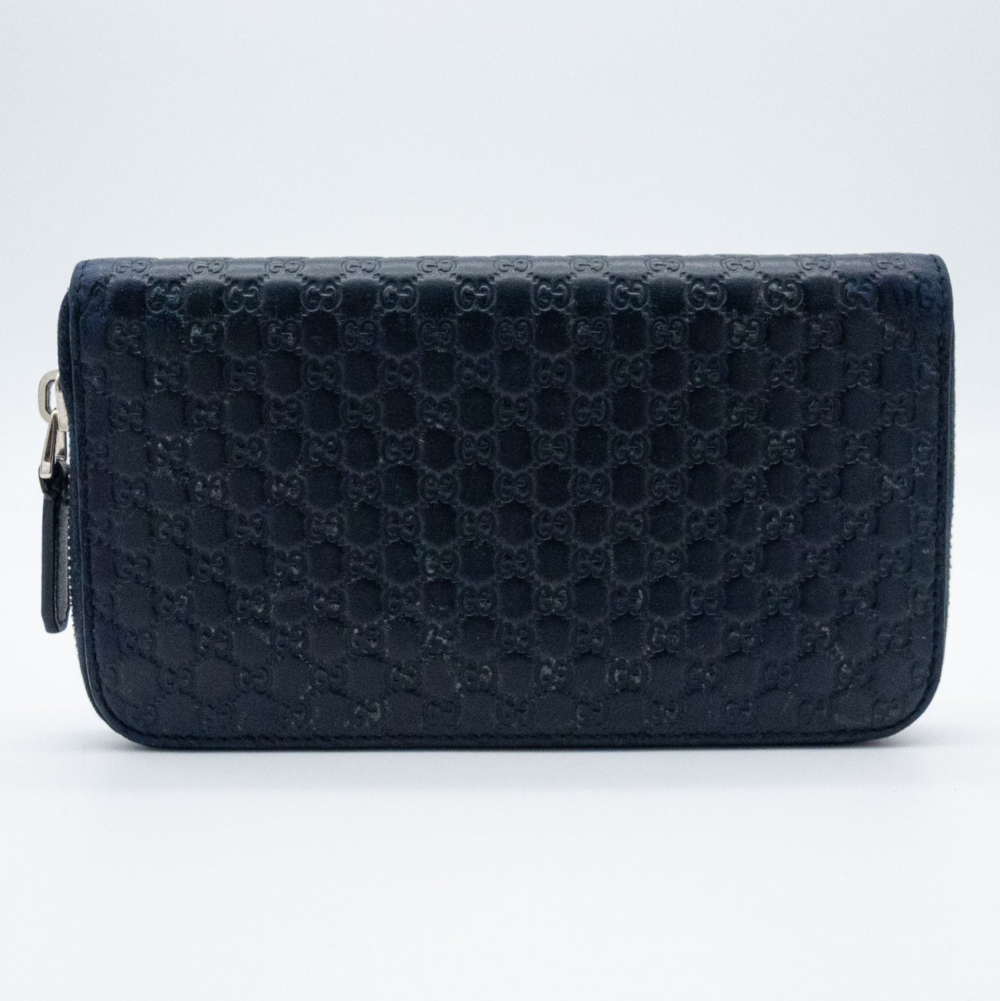 Gucci GG Embossed Navy Blue Zip-Around Wallet