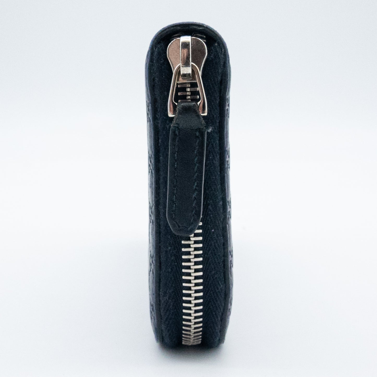 Gucci GG Embossed Navy Blue Zip-Around Wallet