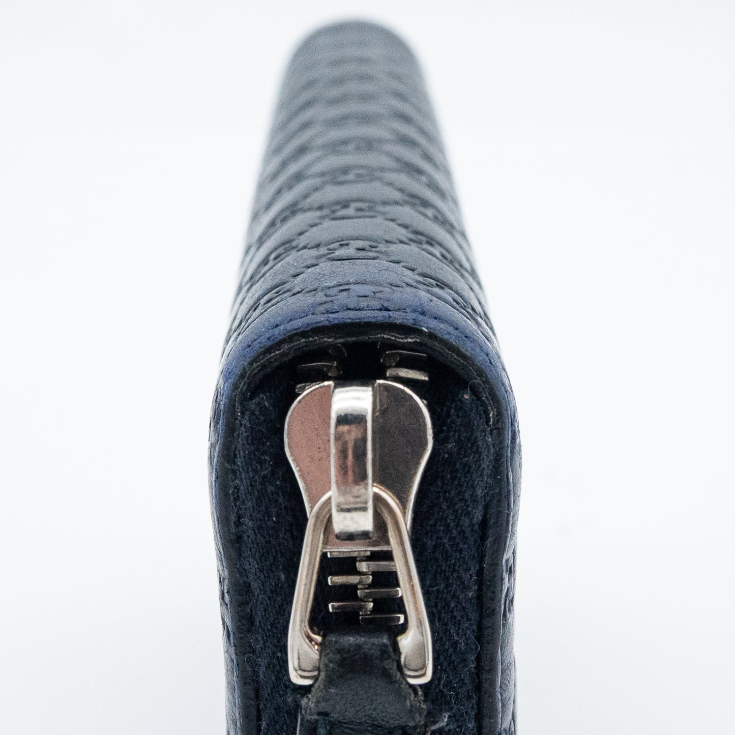 Gucci GG Embossed Navy Blue Zip-Around Wallet