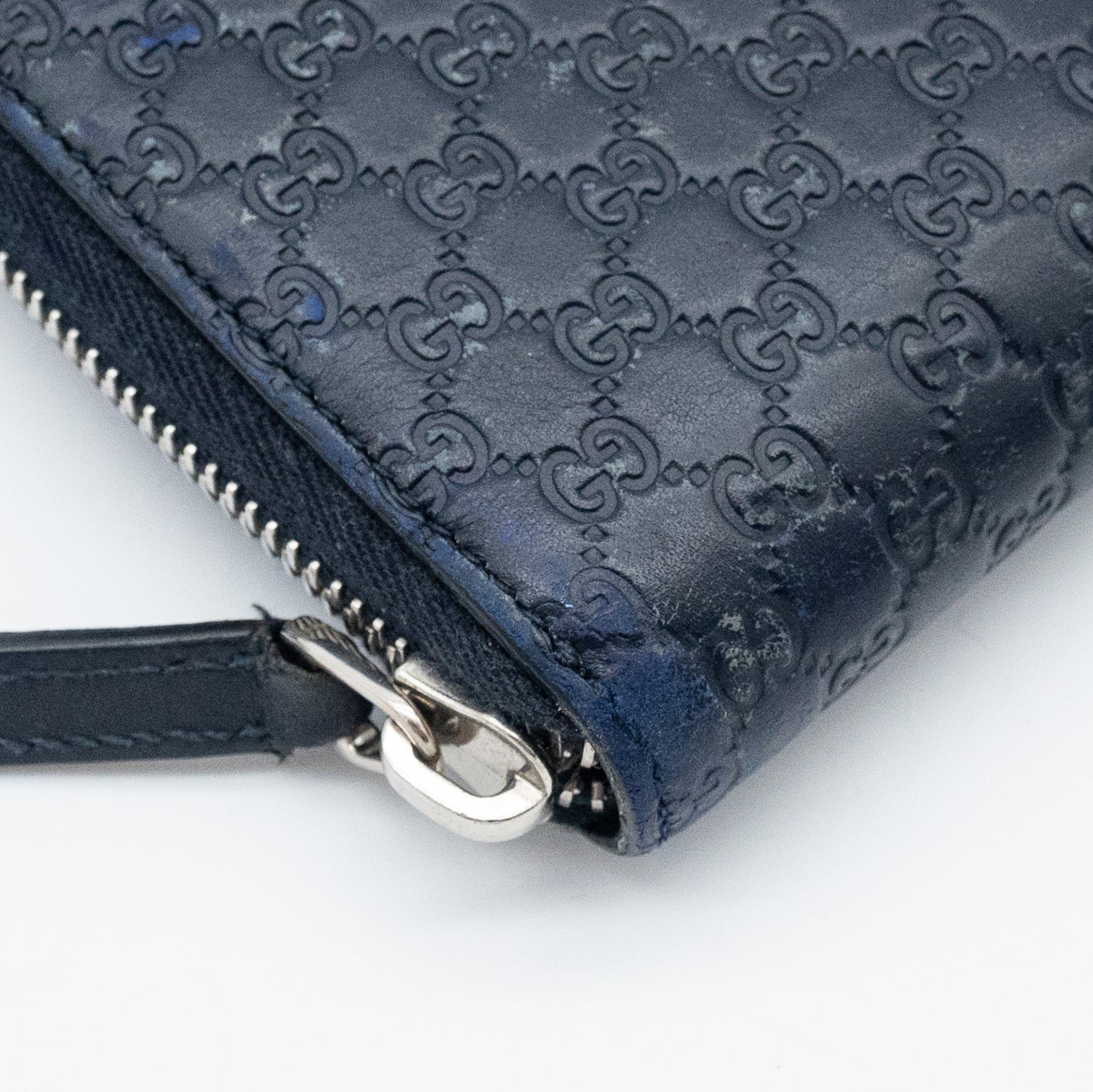 Gucci GG Embossed Navy Blue Zip-Around Wallet
