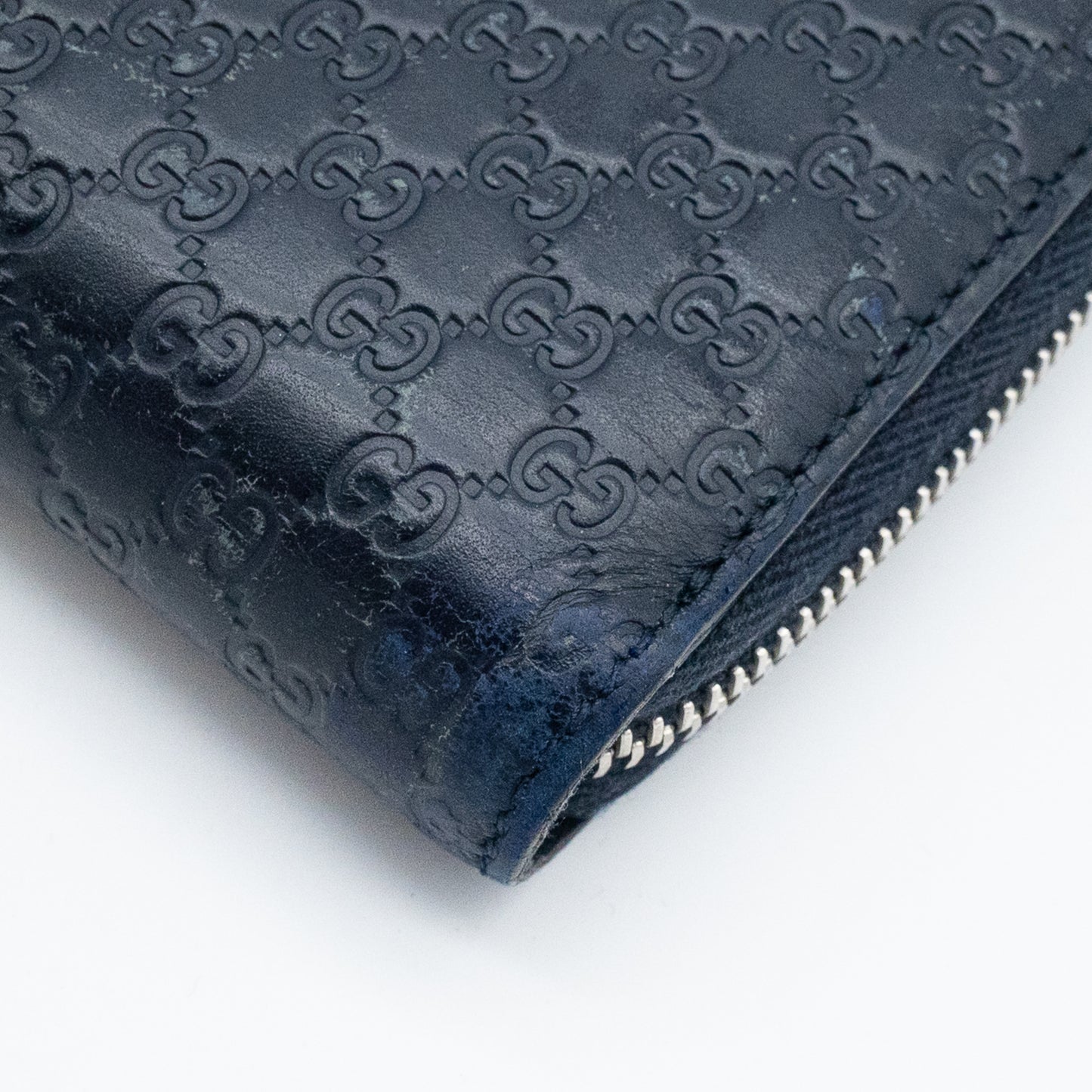 Gucci GG Embossed Navy Blue Zip-Around Wallet