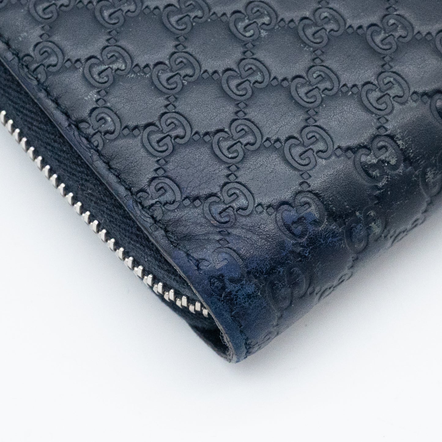 Gucci GG Embossed Navy Blue Zip-Around Wallet