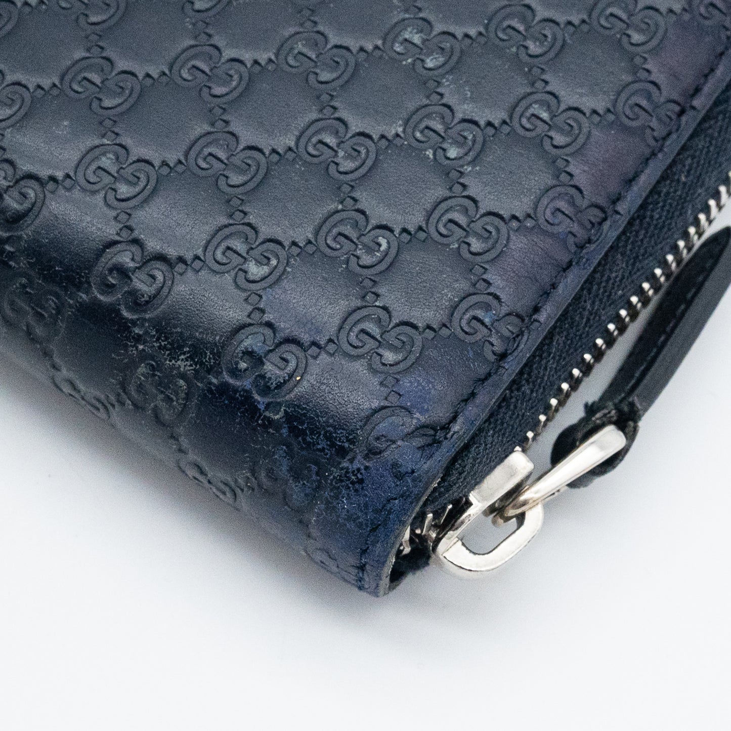 Gucci GG Embossed Navy Blue Zip-Around Wallet