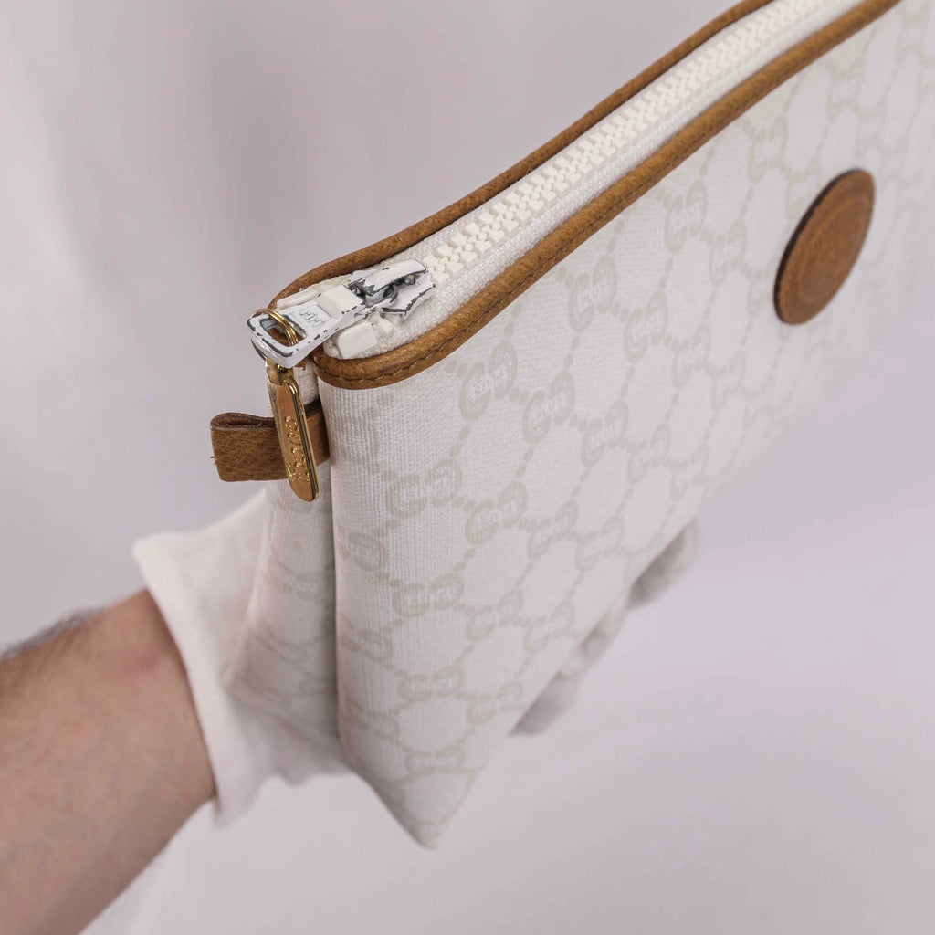 Authentic Vintage Gucci Plus White Monogram Clutch Bag.