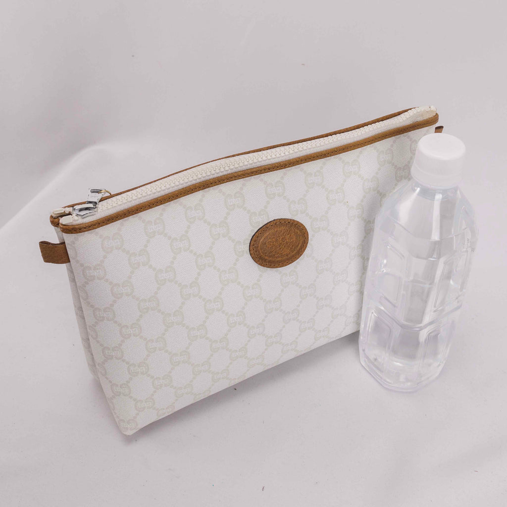 Authentic Vintage Gucci Plus White Monogram Clutch Bag.