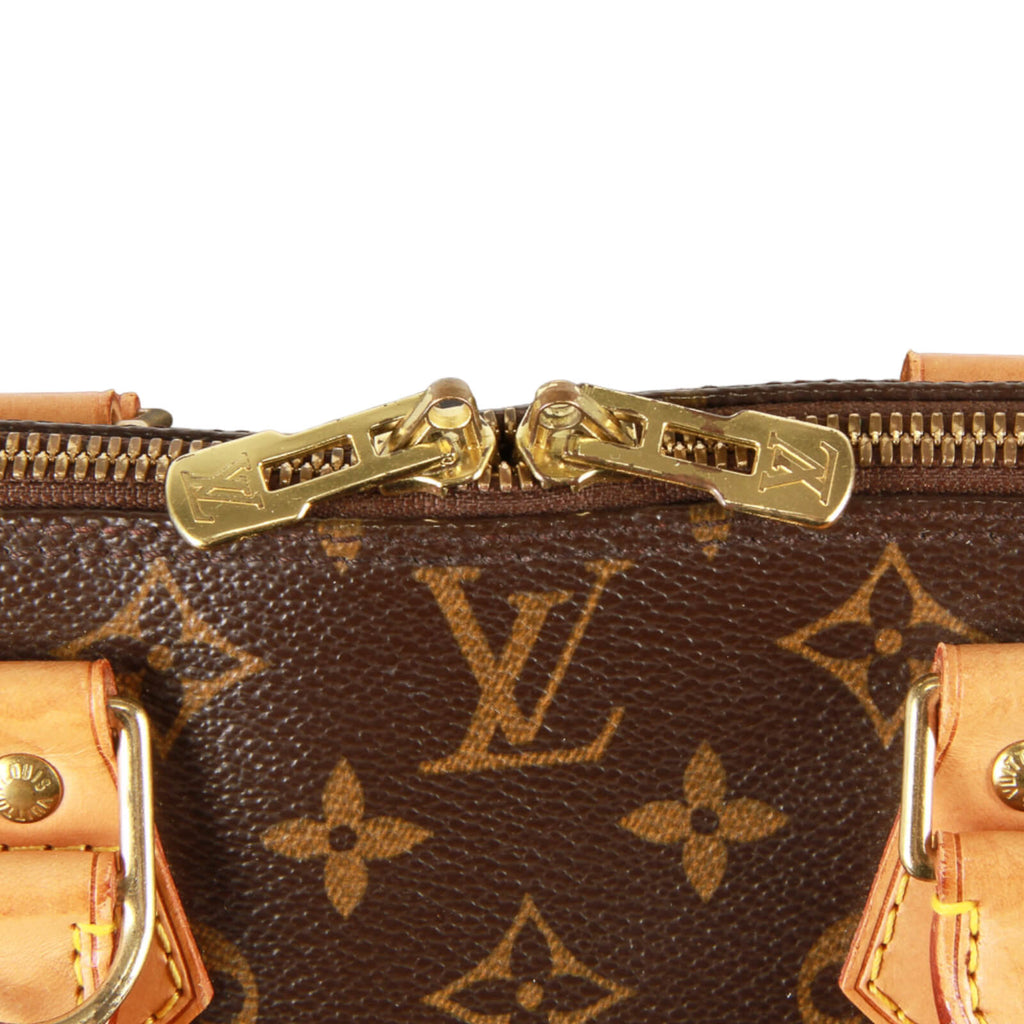 Authentic Louis Vuitton signature monogram canvas Alma Handbag M51130