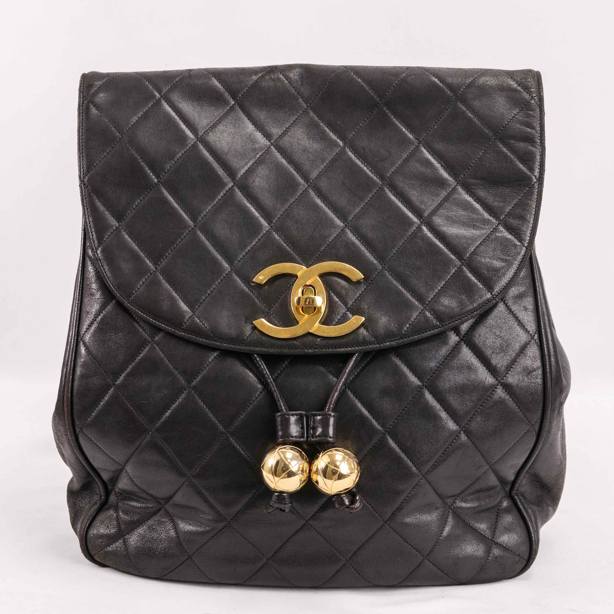 Authentic CHANEL Lambskin Quilted Tassel Drawstring Backpack 