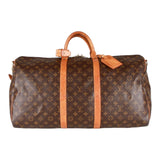 Authentic Louis Vuitton Monogram Keepall bandouliere 55 hand/travel bag