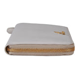 Authentic Prada Saffiano cream leather zip around wallet 1M0506