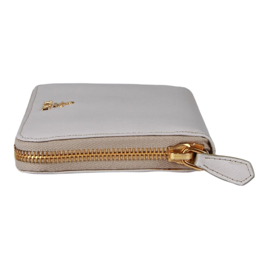 Authentic Prada Saffiano cream leather zip around wallet 1M0506