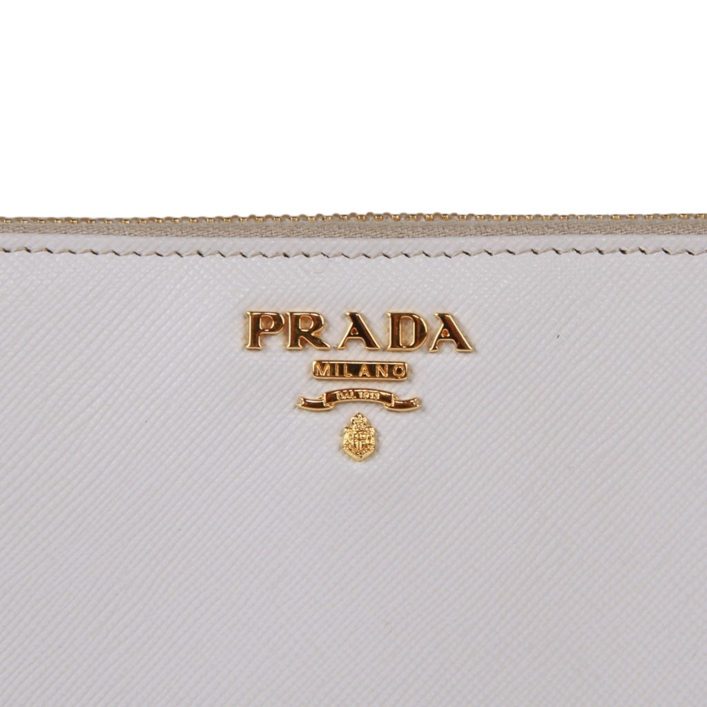 Authentic Prada Saffiano cream leather zip around wallet 1M0506