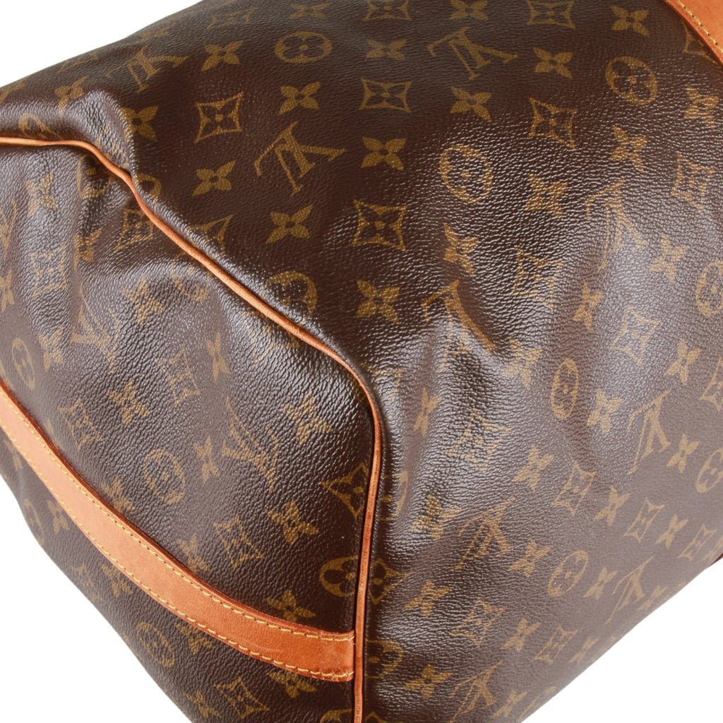 Authentic Louis Vuitton Monogram Keepall bandouliere 55 hand/travel bag