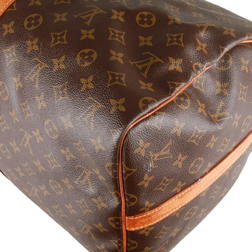 Authentic Louis Vuitton Monogram Keepall bandouliere 55 hand/travel bag