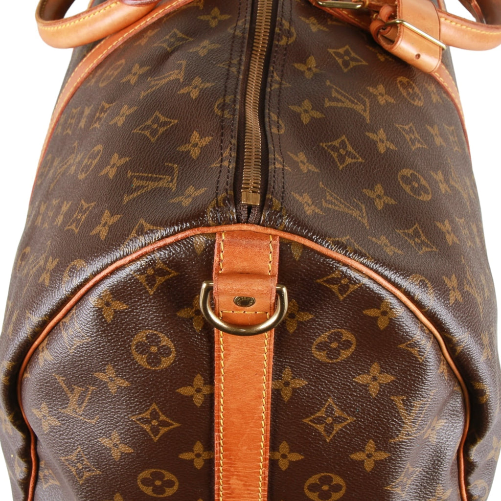 Authentic Louis Vuitton Monogram Keepall bandouliere 55 hand/travel bag