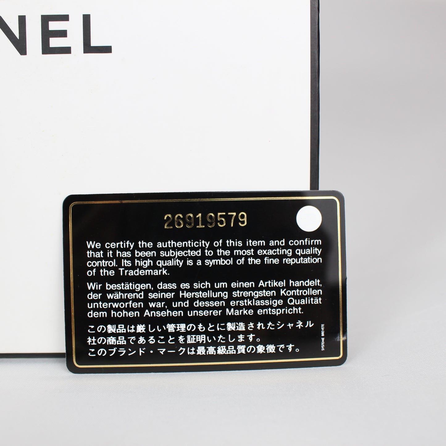 Chanel Cruise Collection “La Pausa” Lifesaver Round Crossbody Bag – White & Black Lambskin – ca. 2019