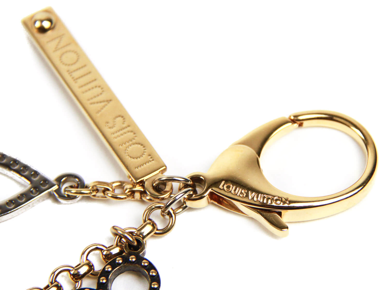 Louis Vuitton Louis Vuitton Bijoux Sac Baxter Gold Tone Key Chain /