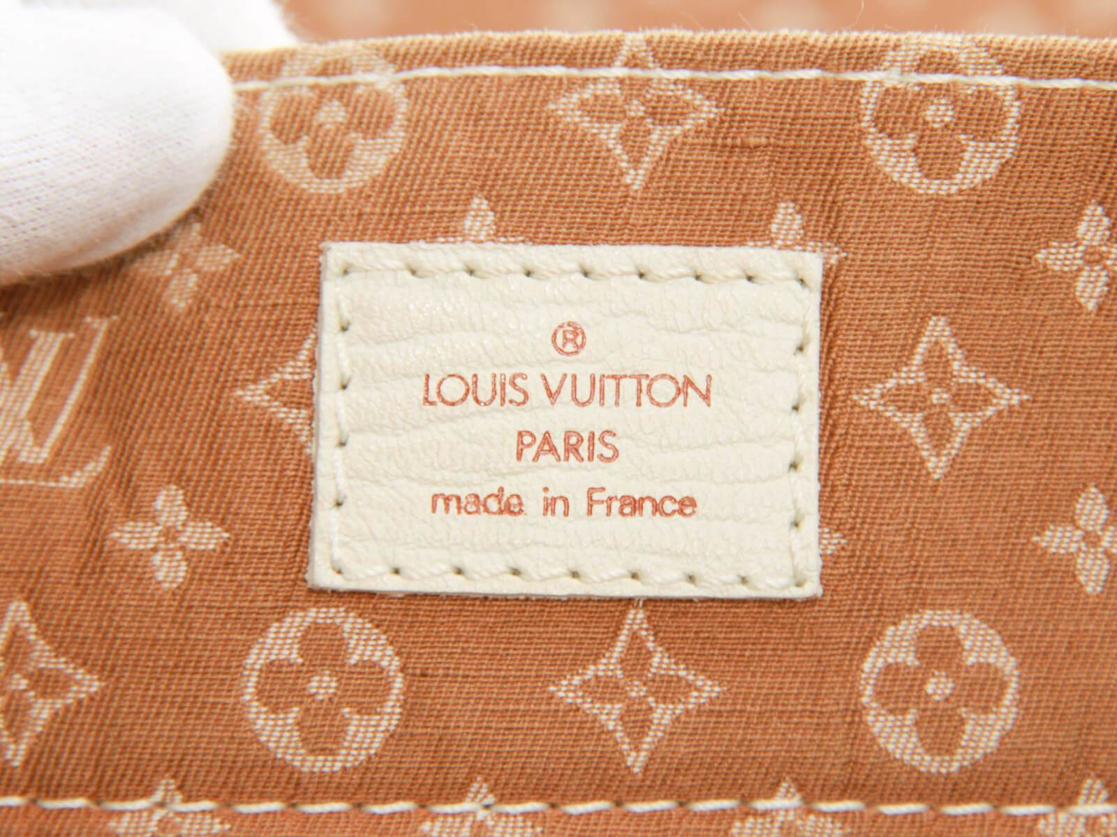 Louis Vuitton // Brown Mini Lin Monogram Flats – VSP Consignment