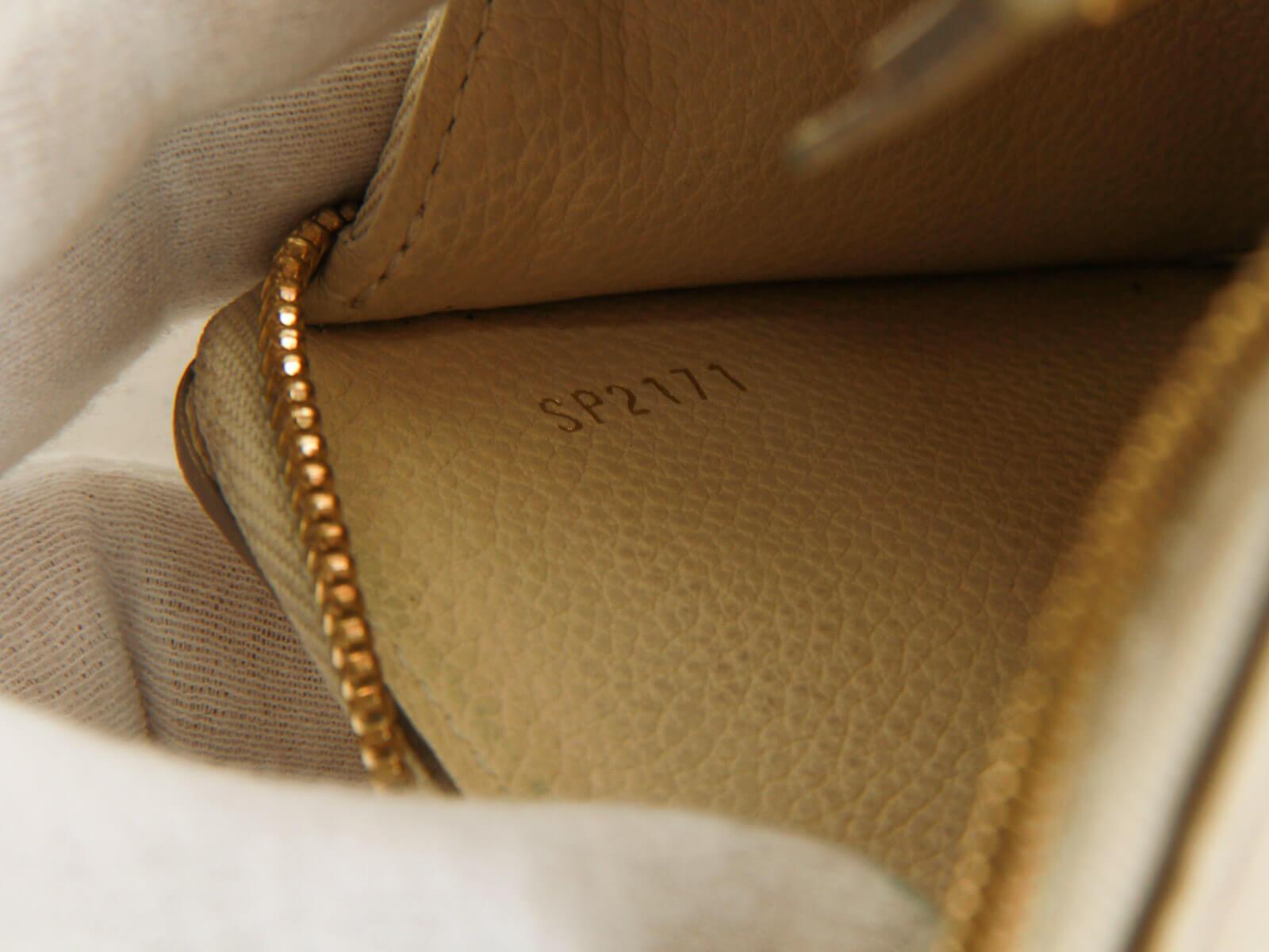 Louis Vuitton White Monogram Empreinte Leather Curieuse Wallet - Yoogi's  Closet