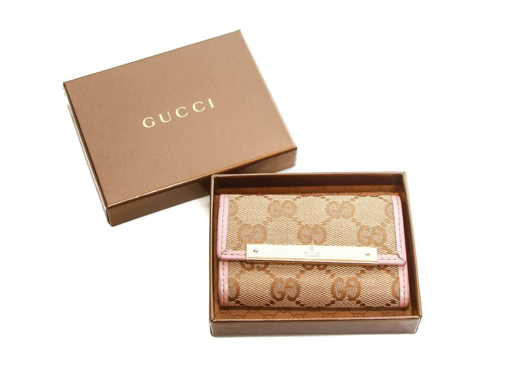 Authentic Gucci monogram canvas pink leather trim key case