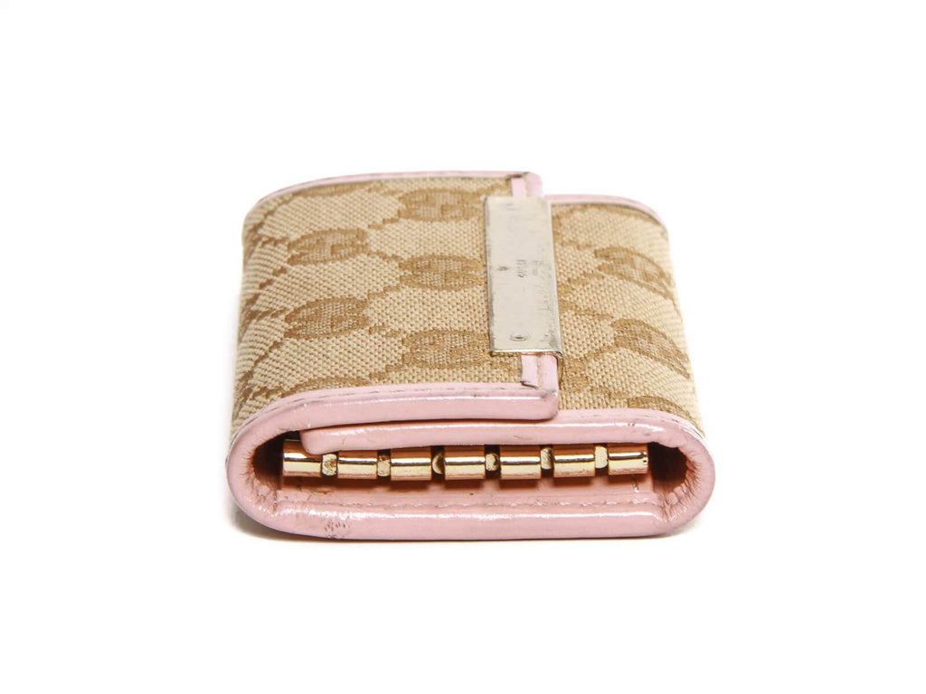 Authentic Gucci monogram canvas pink leather trim key case