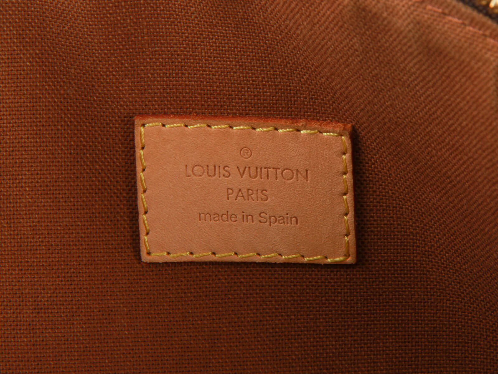 Louis Vuitton Monogram Canvas Lockit. DC: CA0056. Made in Spain
