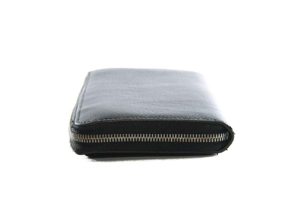 Authentic Must De Cartier black zippy wallet