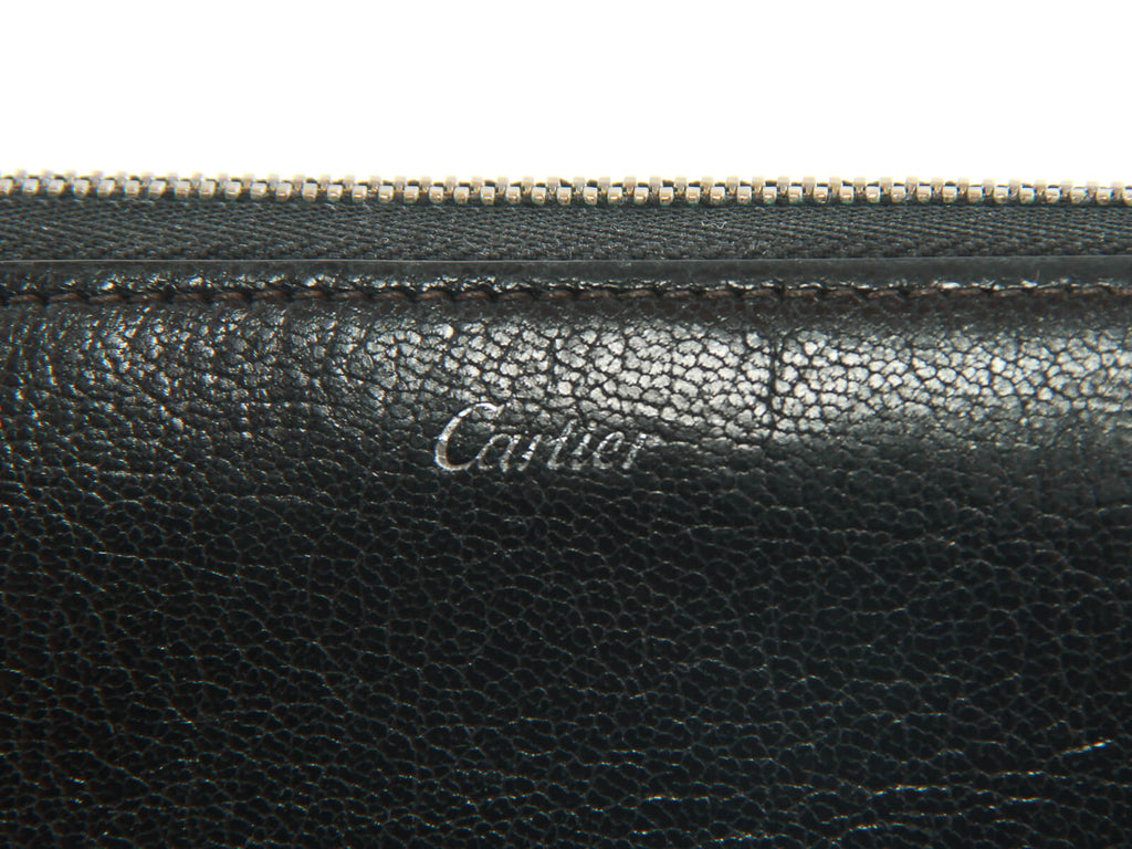 Authentic Must De Cartier black zippy wallet