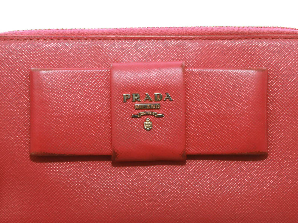 Authentic Prada Saffiano pink leather ribbon zip around wallet