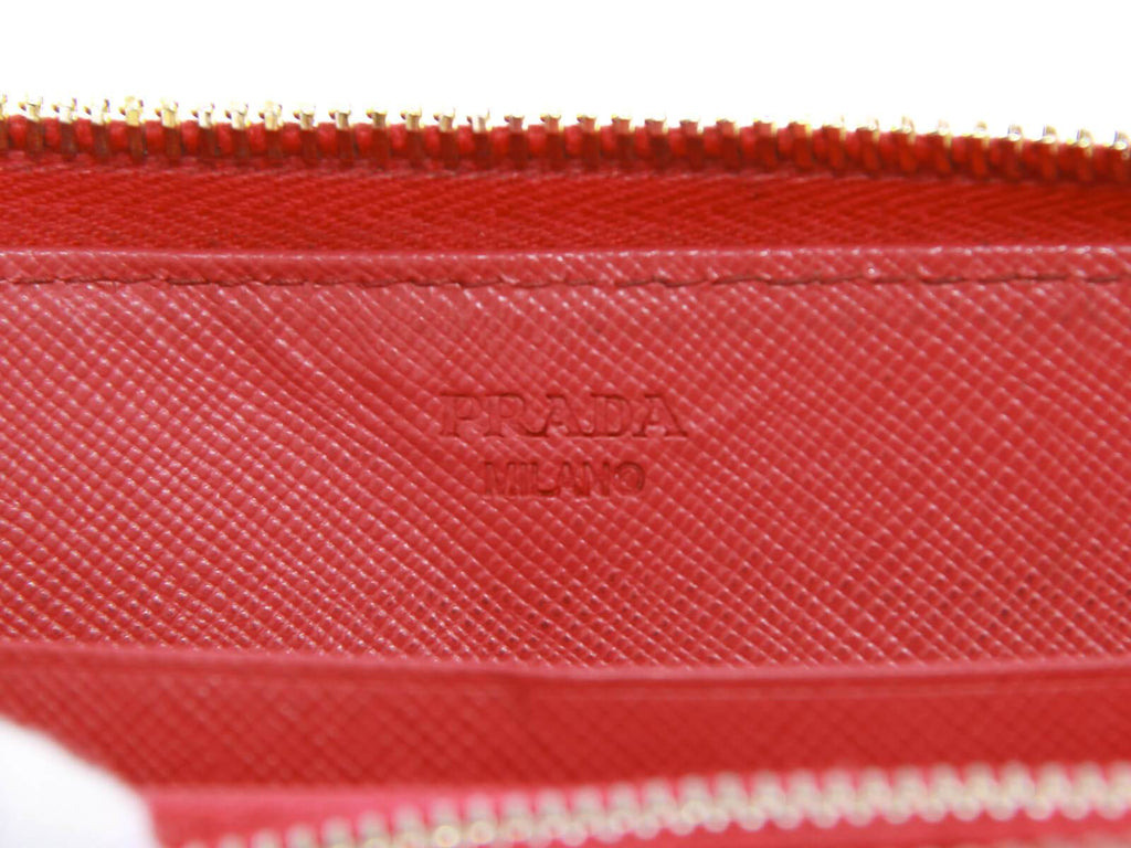 Authentic Prada Saffiano pink leather ribbon zip around wallet