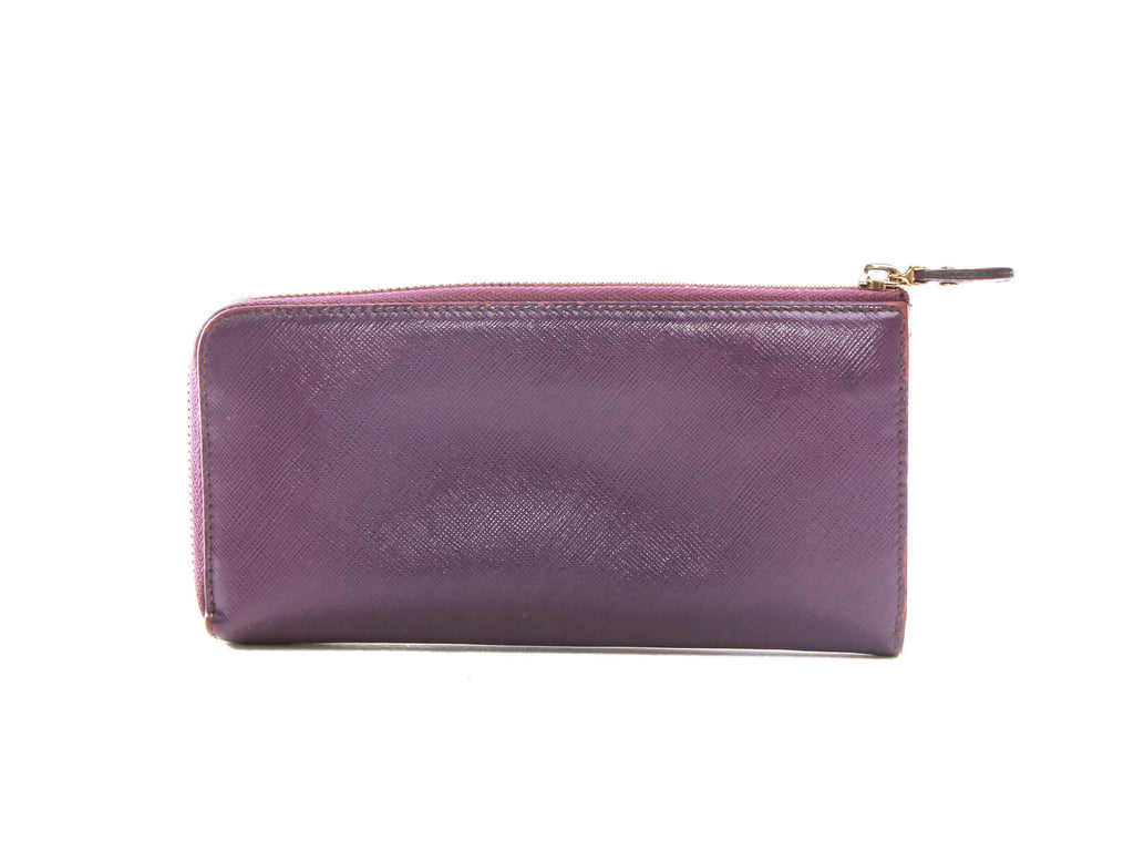 Authentic Salvatore Ferragamo purple Zip-around long wallet